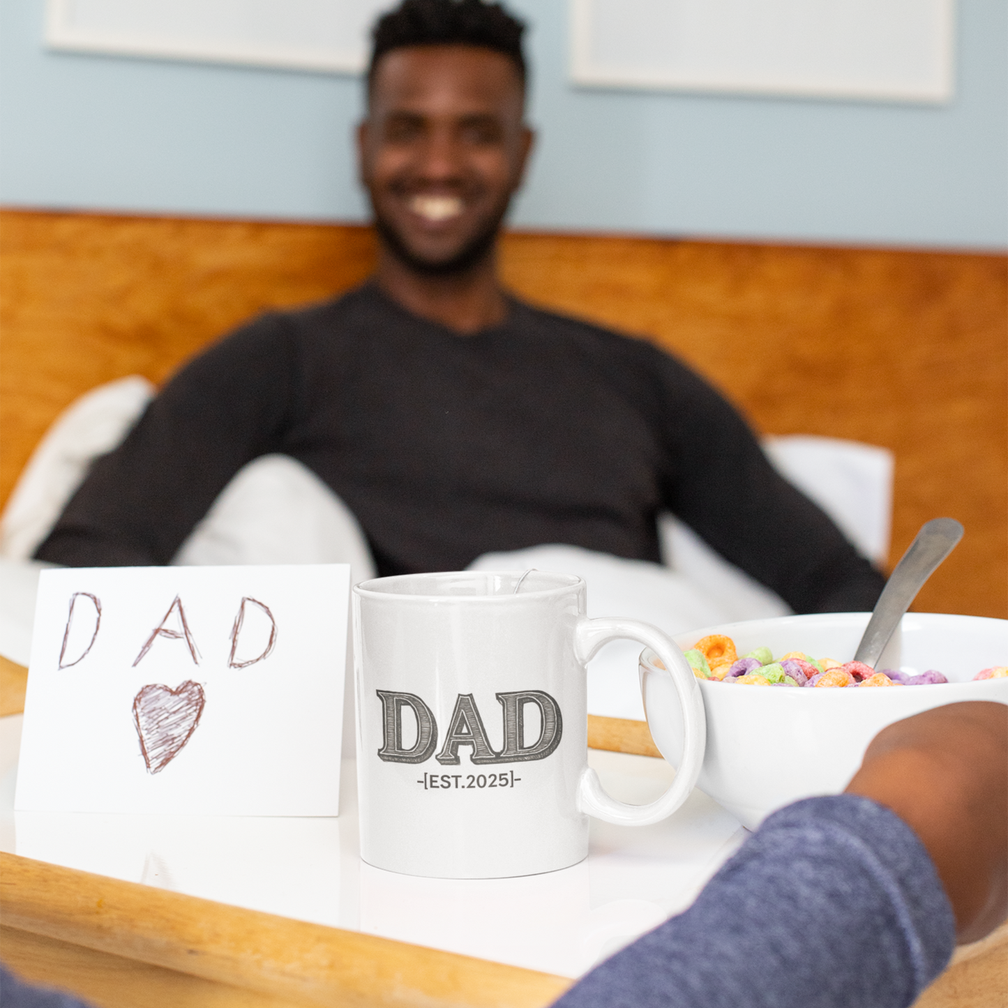 White ceramic coffee mug with bold black text “DAD EST. 2025” printed on the front, designed as a gift for new or expecting fathers.